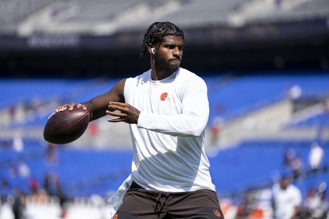 Shedeur Sanders #12 of the Cleveland Browns looks to pass as he warms up prior to an NFL football game against the Baltimore Ravens at M&T Bank Stadium on September 14, 2025 in Baltimore, Maryland.