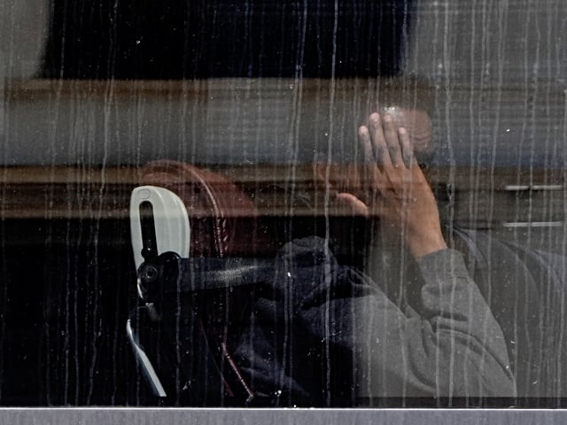 A group of people thought to be migrants are driven away from the Border Force compound in Dover, Kent, following a small boat incident in the Channel. Picture date: Thursday July 10, 2025. (Photo by Gareth Fuller/PA Images via Getty Images)