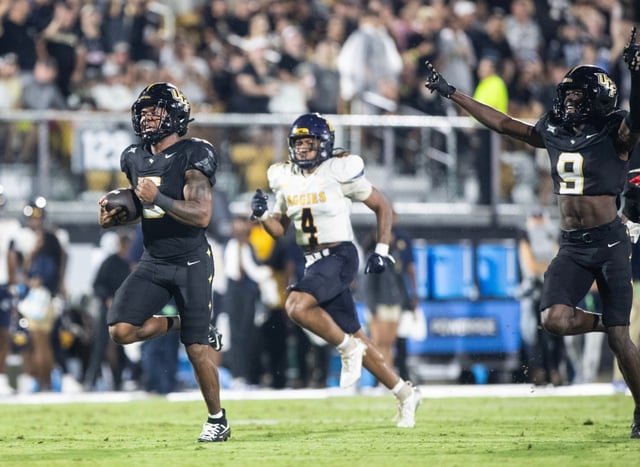 UCF Knights running back Jaden Nixon (5) breaks a long run for a touchdown during the college football game at Acrisure Bounce House Stadium in Orlando, Fla., Saturday, Sept. 6, 2025. (Willie J. Allen Jr./Orlando Sentinel)