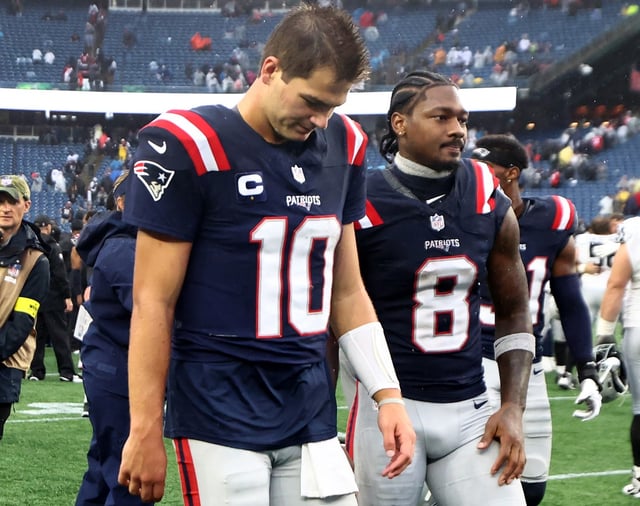 New England Patriots quarterback Drake Maye (10) and Stefon Diggs walk off the field after a loss to the Las Vegas Raiders at Gillette Stadium on Sunday. (Nancy Lane/Boston Herald)
