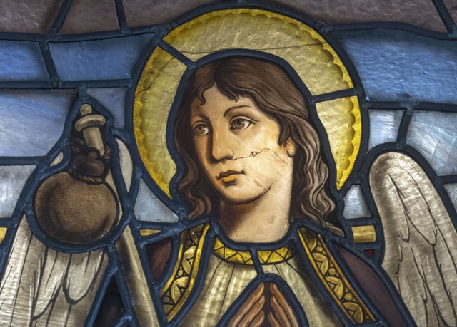Stained glass window featuring (possibly) the Archangel Raphael who is said to guard travelers. La Rabida Monastery, Palos de la Frontera, Huelva Province, Andalusia, southern Spain. The monastery was founded in 1261. It is remembered now as the place Christopher Columbus visited when planning his epic voyage. (Photo by: Ken Welsh/UCG/Universal Images Group via Getty Images)