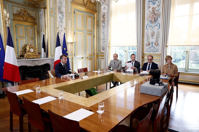 French President Emmanuel Macron (left) attends a video conference with several European and Arab partners ahead of the United Nations General Assembly, during which France and Saudi Arabia will host a meeting on a two-state solution between Israel and the Palestinians, at the Élysée Palace in Paris, Sept.15, 2025. 