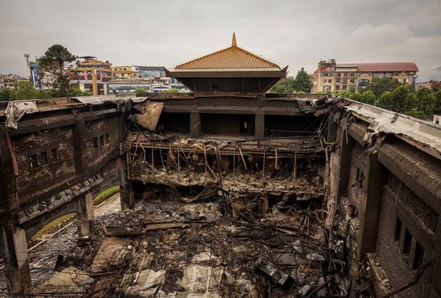 Burnt remains lie inside a section of the Parliament house which was set on fire by the protesters, following the deadly anti-corruption protests triggered by a social media ban, which was later lifted, in Kathmandu, Nepal, September 11, 2025. REUTERS/Adnan Abidi