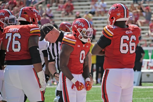 Maryland’s DeJuan Williams reacts after carrying the ball in the first half against Towson University at SECU Stadium. (Kim Hairston/staff).