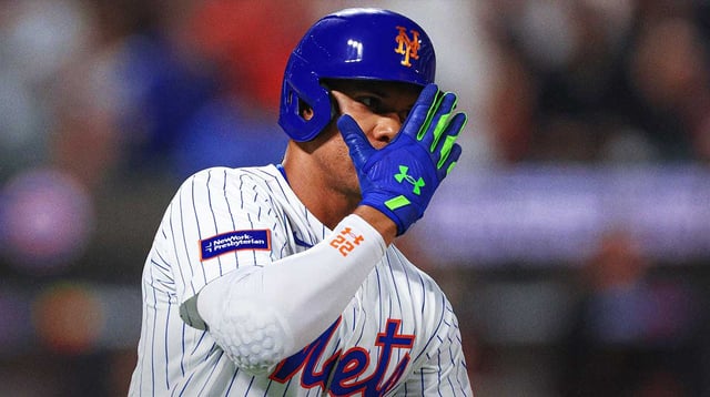 Sep 17, 2025; New York City, New York, USA; New York Mets right fielder Juan Soto (22) hits a home run during the fifth inning against the San Diego Padres at Citi Field. Mandatory Credit: Vincent Carchietta-Imagn Images