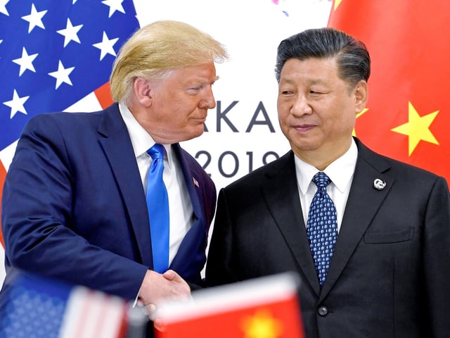FILE - President Donald Trump, left, shakes hands with China's President Xi Jinping during a meeting on the sidelines of the G-20 summit in Osaka, Japan, June 29, 2019. (AP Photo/Susan Walsh, File)