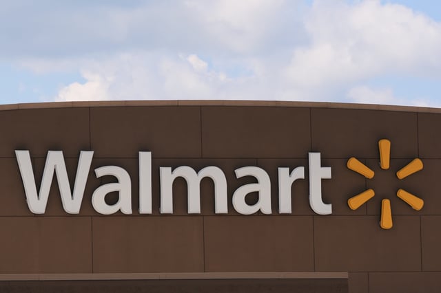 Walmart logo is displayed on a store, Thursday, August 14, 2025, in Manchester, New Hampshire.