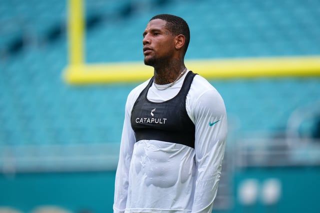 MIAMI GARDENS, FLORIDA - AUGUST 23: Darren Waller #83 of the Miami Dolphins warms up prior to a NFL Preseason 2025 game between Jacksonville Jaguars and Miami Dolphins at Hard Rock Stadium on August 23, 2025 in Miami Gardens, Florida.