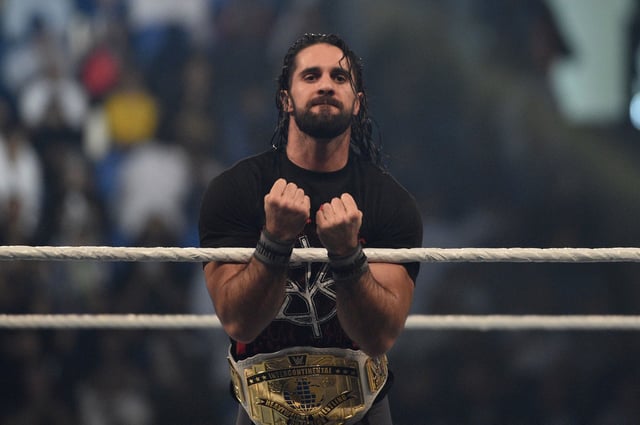 Seth Rollins makes his way to the rign during the WWE World Cup Quarterfinal match as part of as part of the World Wrestling Entertainment (WWE) Crown Jewel pay-per-view at the King Saud University Stadium in Riyadh on November 2, 2018.