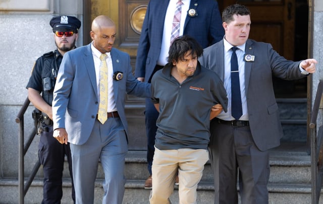 Franklin Batallas is walked from the 45ht Pct. Friday, Sept. 19, 2025 in Manhattan, New York, New York. (Barry Williams/ New York Daily News)