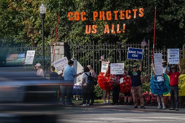Protesters voicing support for the Centers for Disease Control rally outside the agency's Chamblee, Ga., campus on Friday during a meeting of the CDC's Advisory Committee on Immunization Practices. (Elijah Nouvelage/Getty Images)