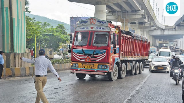 Thane, India - September -19, 2025:: After residents of Ghodbunder Road, distressed by frequent traffic jams, staged a protest on September 16, heavy vehicles were banned from entering the road during the daytime. Traffic police can be seen at Nagla Bandar enforcing this entry ban on heavy vehicles. ,in Thane ,in Mumbai, India, on, Friday, September -19, 2025. ( Praful Gangurde / HT Photo )