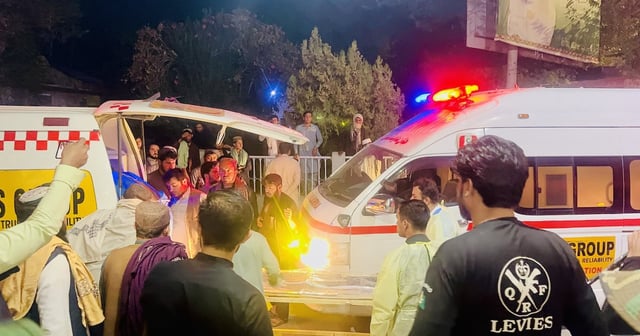 Paramedics take injured survivors of a bombing on Thursday night in Chaman, Pakistan, to hospital. EPA