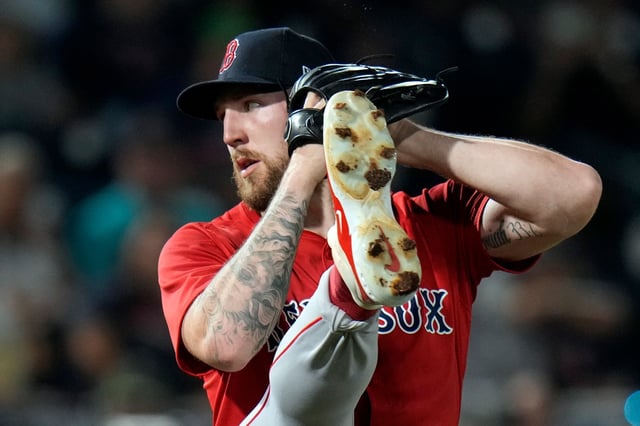 Boston Red Sox's Garrett Crochet kicks before throwing a pitch to the Tampa Bay Rays during the first inning of a game Friday in Tampa, Fla. (AP Photo/Chris O'Meara)