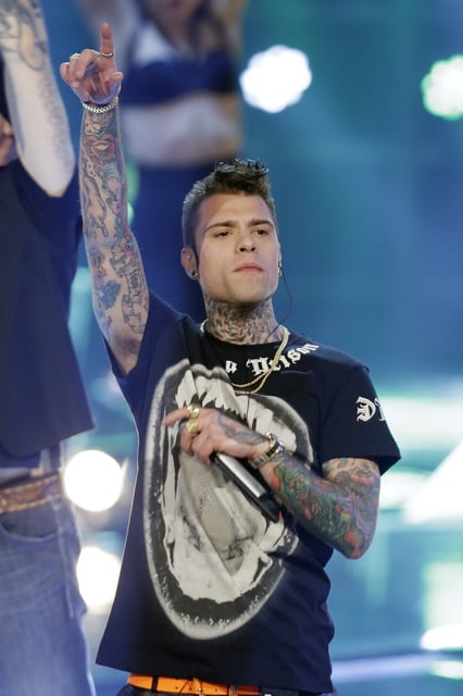 FILE - In this photo taken on May 28, 2014, Italian rapper Fedez perform during the Italian State RAI TV program "The Voice of Italy", in Milan, Italy. (AP Photo/Luca Bruno, file)