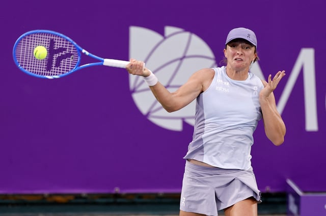 Tennis - WTA 500 - Korea Open - Olympic Park Tennis Center, Seoul, South Korea - September 20, 2025 Poland's Iga Swiatek in action during her semifinal match against Australia's Maya Joint REUTERS/Kim Soo-Hyeon
