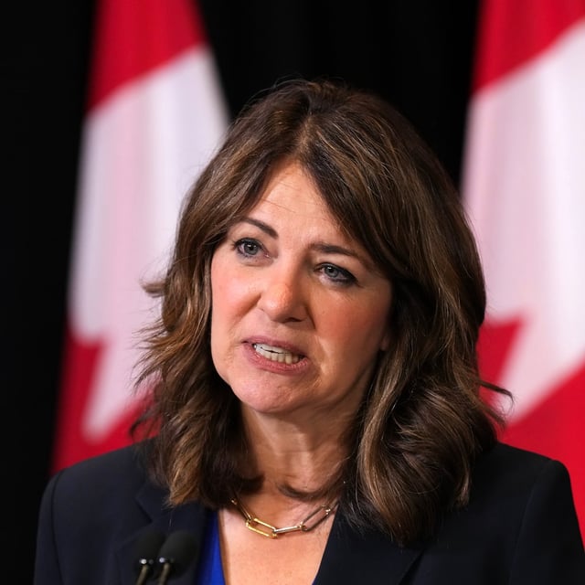 Alberta Premier Danielle Smith speaks to the media after signing a memorandum of understanding with Ontario and Saskatchewan during the 2025 summer meetings of Canada's Premiers at Deerhurst Resort in Huntsville, Ont., on Tuesday, July 22, 2025. THE CANADIAN PRESS/Nathan Denette