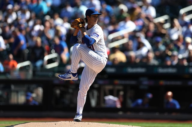 Jonah Tong #21 of the New York Mets pitches during the game against the San Diego Padres at Citi Field on September 18, 2025 in the Queens borough of New York City.