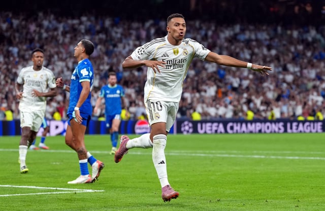 Kylian Mbappe of Real Madrid celebrates scoring his team's second goal from the penalty spot during the UEFA Champions League 2025/26 League Phase MD1 match between Real Madrid C.F. and Olympique de Marseille at Estadio Santiago Bernabeu on September 16, 2025 in Madrid, Spain.
