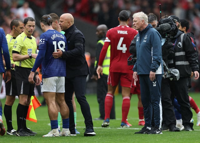 Soccer Football - Premier League - Liverpool v Everton - Anfield, Liverpool, Britain - September 20, 2025 Everton's Jack Grealish, Everton manager David Moyes and Liverpool manager Arne Slot with referee Darren England after the match REUTERS/David Klein