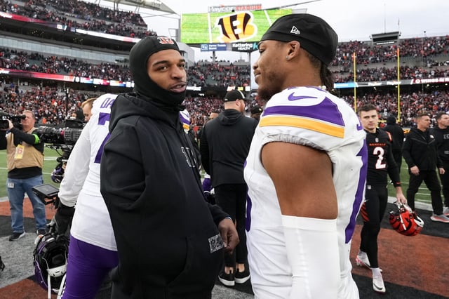 CINCINNATI, OHIO - DECEMBER 16: Ja'Marr Chase #1 of the Cincinnati Bengals and Justin Jefferson #18 of the Minnesota Vikings meet after the Bengals beat the Vikings 27-24 in overtime at Paycor Stadium on December 16, 2023 in Cincinnati, Ohio.