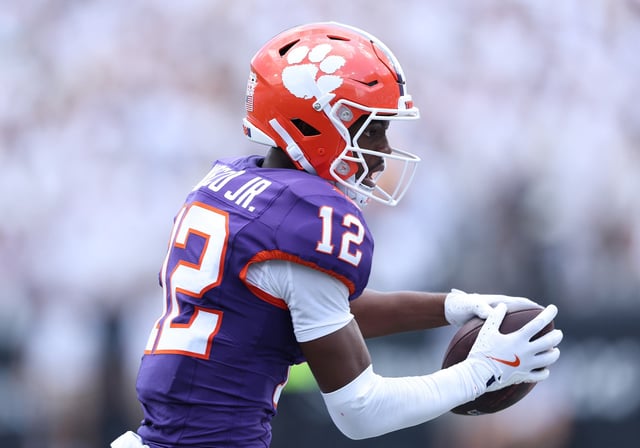 Bryant Wesco Jr. #12 of the Clemson Tigers pulls in this reception during the fourth quarter of the game between the Clemson Tigers and Georgia Tech Yellow Jackets at Bobby Dodd Stadium on September 13, 2025 in Atlanta, Georgia.