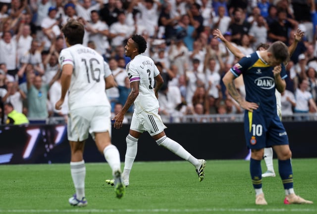 Soccer Football - LaLiga - Real Madrid v Espanyol - Santiago Bernabeu, Madrid, Spain - September 20, 2025 Real Madrid's Eder Militao celebrates scoring their first goal REUTERS/Juan Medina