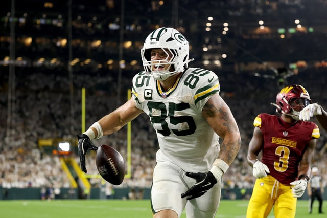Tucker Kraft #85 of the Green Bay Packers celebrates after scoring an 8 yard touchdown against the Washington Commanders during the fourth quarter in the game at Lambeau Field on September 11, 2025 in Green Bay, Wisconsin.