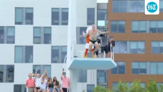 Pat McAfee jumped from a high dive in a Speedo.