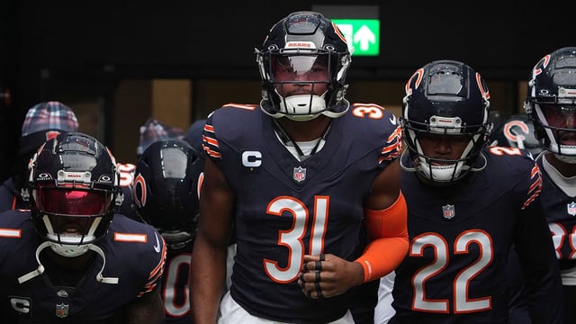 Oct 13, 2024; London, United Kingdom; Chicago Bears cornerback Jaylon Johnson (1), safety Kevin Byard III (31 and safety Elijah Hicks (22) enter the field against the Jacksonville Jaguars during an NFL International Series game at Tottenham Hotspur Stadium. Mandatory Credit: Kirby Lee-Imagn Images