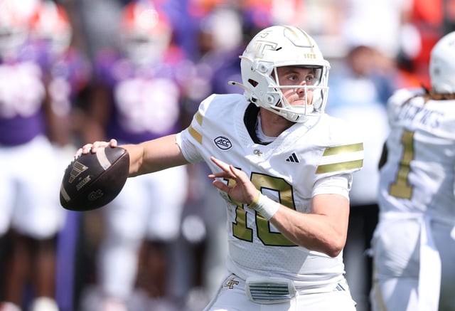 Haynes King #10 of the Georgia Tech Yellow Jackets looks to pass during the fourth quarter of the game between the Clemson Tigers and Georgia Tech Yellow Jackets at Bobby Dodd Stadium on September 13, 2025 in Atlanta, Georgia.