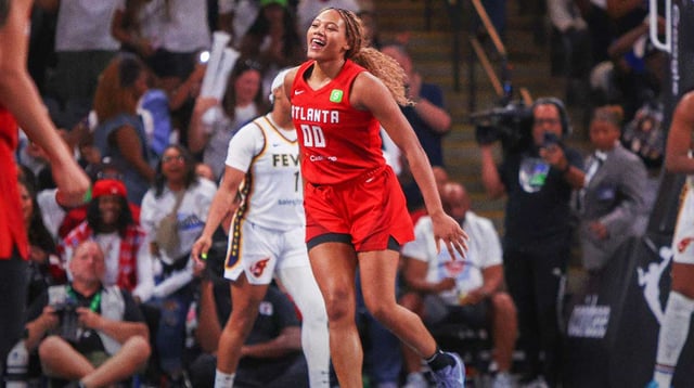 Sep 14, 2025; College Park, Georgia, USA; Atlanta Dream forward Naz Hillmon (00) reacts after a basket against the Indiana Fever in the fourth quarter during game one of round one for the 2025 WNBA Playoffs at Gateway Center Arena at College Park. Mandatory Credit: Brett Davis-Imagn Images