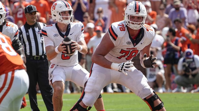 Sep 20, 2025; Clemson, South Carolina, USA; Syracuse Orange quarterback Steve Angeli (9) takes a snap near offensive lineman Joe Cruz (78) playing the Clemson Tigers during the first quarter at Memorial Stadium. Mandatory Credit: Ken Ruinard/GREENVILLE NEWS-USA TODAY Network via Imagn Images