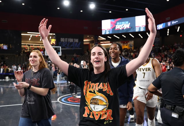 Caitlin Clark #22 of the Indiana Fever celebrates their 87-85 win in game three of the first round of WNBA Playoffs between the Indiana Fever and Atlanta Dream at Gateway Center Arena on September 18, 2025 in College Park, Georgia.