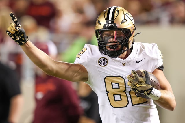 Brycen Coleman #82 of the Vanderbilt Commodores reacts after a touchdown against the Virginia Tech Hokies in the first half during a game at Lane Stadium on September 6, 2025 in Blacksburg, Virginia. (Photo by Ryan Hunt/Getty Images)