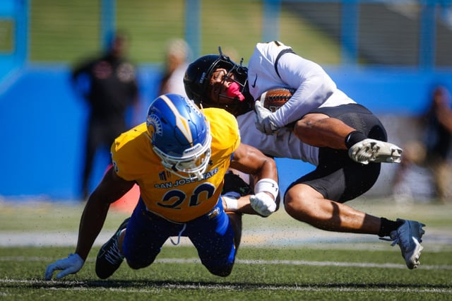 San Jose State’s Isiah Revis (20) tackles Idaho’s Emmerson Cortez-Menjivar (7) in the first quarter at CEFCU Stadium in San Jose, Calif., on Saturday, Sept. 20, 2025. (Shae Hammond/Bay Area News Group)