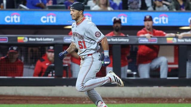 Sep 20, 2025; New York City, New York, USA; Washington Nationals designated hitter Daylen Lile (51) hits a two run inside the park home run in the eleventh inning against the New York Mets at Citi Field. Mandatory Credit: Wendell Cruz-Imagn Images