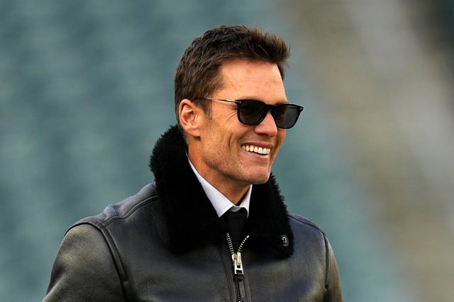 Former NFL Player Tom Brady looks on prior to the NFC Wild Card Playoff between the Green Bay Packers and the Philadelphia Eagles at Lincoln Financial Field on January 12, 2025 in Philadelphia, Pennsylvania.