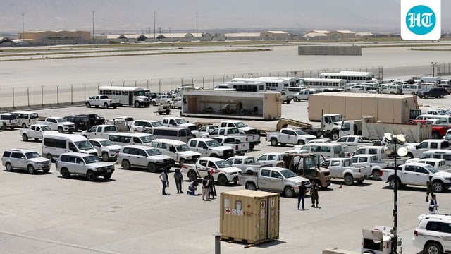 Parked vehicles are seen in Bagram US air base, after American troops vacated it, in Parwan province, Afghanistan.