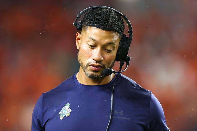 Head coach Marcus Freeman of the Notre Dame Fighting Irish looks on against the Miami Hurricanes during the second quarter of the game at Hard Rock Stadium on August 31, 2025 in Miami Gardens, Florida.