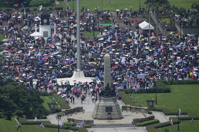 Protesters gathers during an anti-corruption rally in Manila's Rizal Park, Philippines on Sunday, Sept. 21, 2025. (AP Photo/Aaron Favila)