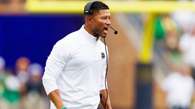 Notre Dame head coach Marcus Freeman celebrates after an interception by cornerback Christian Gray during the first half of a NCAA football game against Purdue at Notre Dame Stadium on Saturday, Sept. 20, 2025, in South Bend.  © MICHAEL CLUBB/SOUTH BEND TRIBUNE / USA TODAY NETWORK via Imagn Images