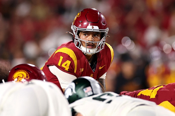 LOS ANGELES, CALIFORNIA – SEPTEMBER 20: Jayden Maiava #14 of the USC Trojans looks across the line of scrimmage against the Michigan State Spartans during the fourth quarter at Los Angeles Memorial Coliseum on September 20, 2025 in Los Angeles, California. (Photo by Luke Hales/Getty Images)