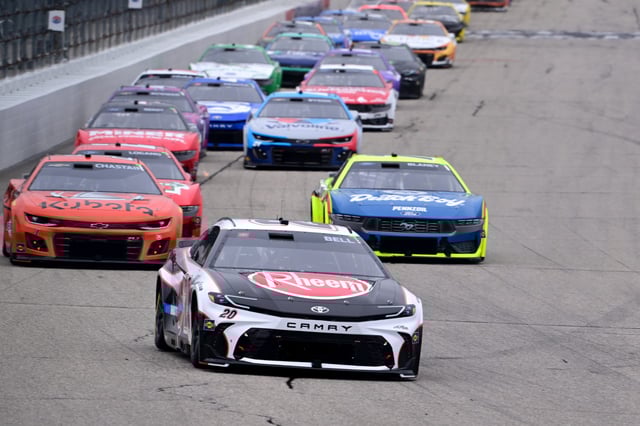 Christopher Bell (20) leads a pack of cars during the USA TODAY 301 NASCAR Cup Series race at New Hampshire Motor Speedway on June 23, 2024.
