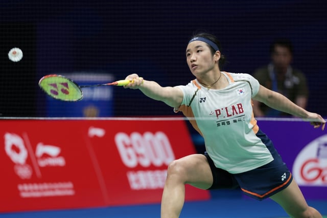 South Korea’s An Se-young hits a return to China’s Han Yue during their women's singles final at the China Masters badminton tournament in Shenzhen in China's southern Guangdong province on September 21, 2025.