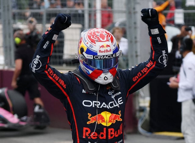 Max Verstappen celebrates winning the Azerbaijan Grand Prix.