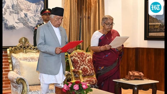 Nepalese President Ram Chandra Poudel administering the oath of office to interim Prime Minister Sushila Karki. (AP)