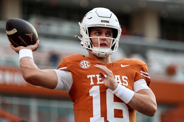 Arch Manning #16 of the Texas Longhorns warms up before the game against the Sam Houston State Bearkats at Darrell K Royal-Texas Memorial Stadium on September 20, 2025 in Austin, Texas.
