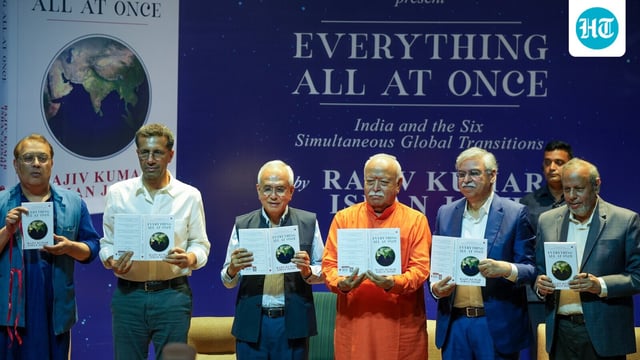 Rashtriya Swayamsevak Sangh (RSS) chief Mohan Bhagwat and others launch the book 'Everything All At Once: India and the Six Simultaneous Global Transitions' written by Rajiv Kumar and Ishan Joshi at a ceremony in New Delhi on Sunday, September 21, 2025