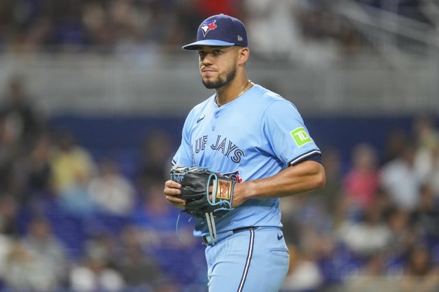 MIAMI, FLORIDA - AUGUST 23: José Berríos #17 of the Toronto Blue Jays heads to the dugout after being pulled from the game during the seventh inning against the Miami Marlins at loanDepot park on August 23, 2025 in Miami, Florida.
